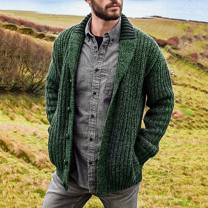 Men's green shawl collar knit cardigan worn open over a shirt