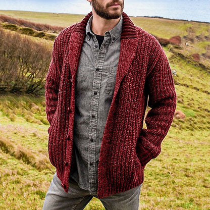 Men's red shawl collar knit cardigan worn open over a shirt